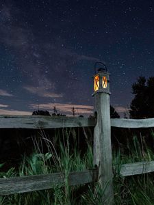 Preview wallpaper lantern, fence, starry sky, sky, night, grass