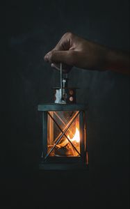 Preview wallpaper lantern, fire, flame, hand, glow