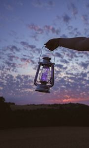 Preview wallpaper lantern, garland, hand, dusk, sky