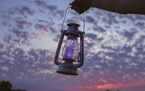 Preview wallpaper lantern, garland, hand, dusk, sky