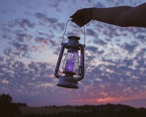 Preview wallpaper lantern, garland, hand, dusk, sky