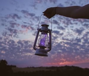 Preview wallpaper lantern, garland, hand, dusk, sky