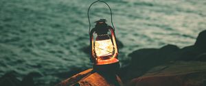 Preview wallpaper lantern, garland, light, stones, shore
