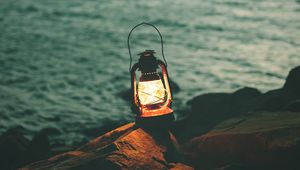 Preview wallpaper lantern, garland, light, stones, shore