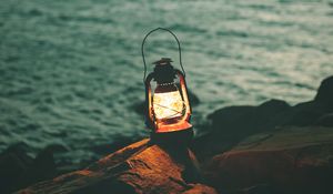 Preview wallpaper lantern, garland, light, stones, shore