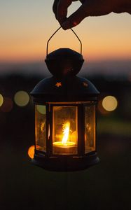 Preview wallpaper lantern, glow, hand, dark