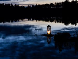 Preview wallpaper lantern, lake, water, stone, dark