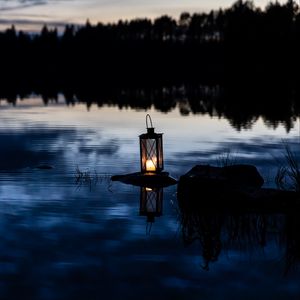Preview wallpaper lantern, lake, water, stone, dark