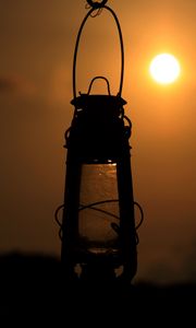 Preview wallpaper lantern, lamp, sun, sunset, dark