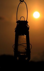 Preview wallpaper lantern, lamp, sun, sunset, dark