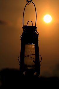 Preview wallpaper lantern, lamp, sun, sunset, dark