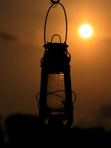 Preview wallpaper lantern, lamp, sun, sunset, dark