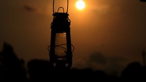 Preview wallpaper lantern, lamp, sun, sunset, dark