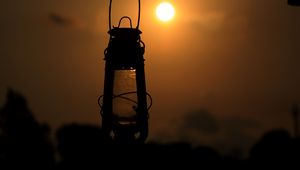 Preview wallpaper lantern, lamp, sun, sunset, dark