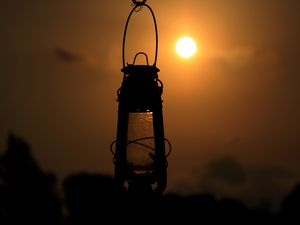 Preview wallpaper lantern, lamp, sun, sunset, dark