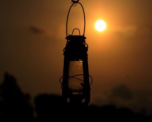 Preview wallpaper lantern, lamp, sun, sunset, dark