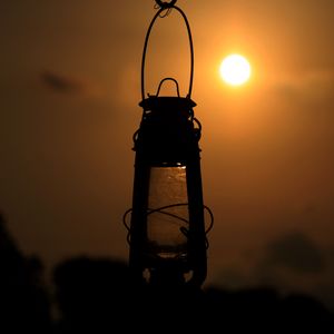 Preview wallpaper lantern, lamp, sun, sunset, dark