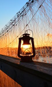 Preview wallpaper lantern, lamp, sunset, light, dark