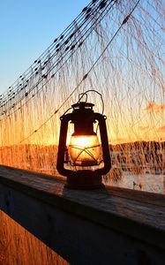 Preview wallpaper lantern, lamp, sunset, light, dark