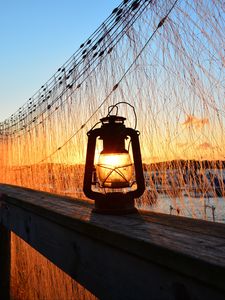 Preview wallpaper lantern, lamp, sunset, light, dark
