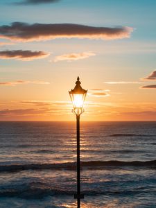 Preview wallpaper lantern, sea, horizon, sunset, clouds
