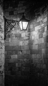 Preview wallpaper lantern, wall, bricks, black and white