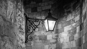 Preview wallpaper lantern, wall, bricks, black and white