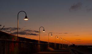 Preview wallpaper lanterns, road, evening, sunset