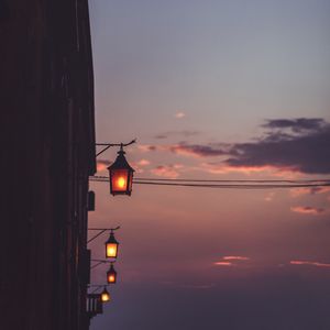Preview wallpaper lanterns, sunset, sky, roof