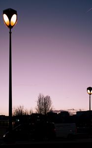 Preview wallpaper lanterns, trees, cars, buildings, sky, evening