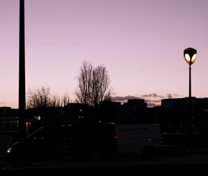 Preview wallpaper lanterns, trees, cars, buildings, sky, evening