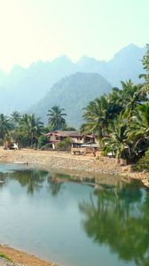 Preview wallpaper laos, tropics, palm trees, river, huts