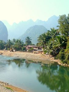 Preview wallpaper laos, tropics, palm trees, river, huts