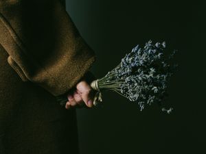 Preview wallpaper lavender, bouquet, hand, flowers, dark