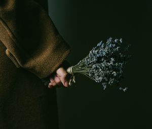 Preview wallpaper lavender, bouquet, hand, flowers, dark