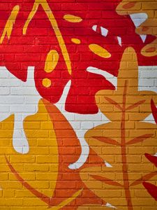 Preview wallpaper leaves, graffiti, bricks, surface, texture