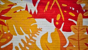 Preview wallpaper leaves, graffiti, bricks, surface, texture