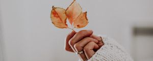 Preview wallpaper leaves, hand, fingers, sweater, ring