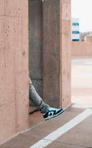 Preview wallpaper leg, sneakers, building, wall