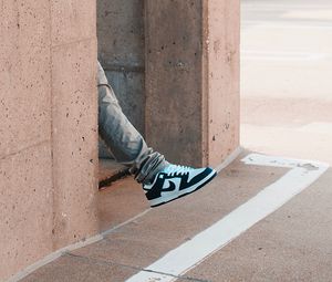 Preview wallpaper leg, sneakers, building, wall