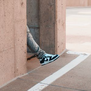 Preview wallpaper leg, sneakers, building, wall