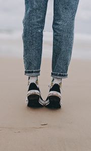 Preview wallpaper legs, beach, sand, person