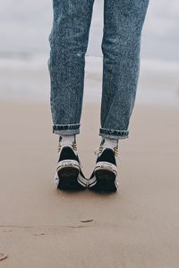 Preview wallpaper legs, beach, sand, person