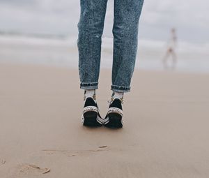 Preview wallpaper legs, beach, sand, person