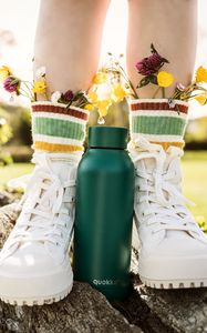 Preview wallpaper legs, boots, flowers, thermos, style