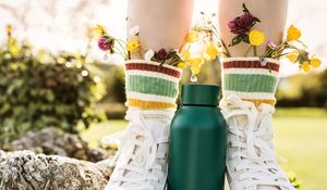 Preview wallpaper legs, boots, flowers, thermos, style