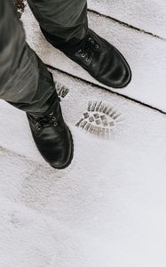 Preview wallpaper legs, boots, footprint, snow