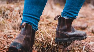 Preview wallpaper legs, boots, jeans, walking, movement, forest