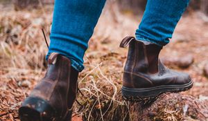 Preview wallpaper legs, boots, jeans, walking, movement, forest