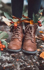 Preview wallpaper legs, boots, leaves, berries, autumn